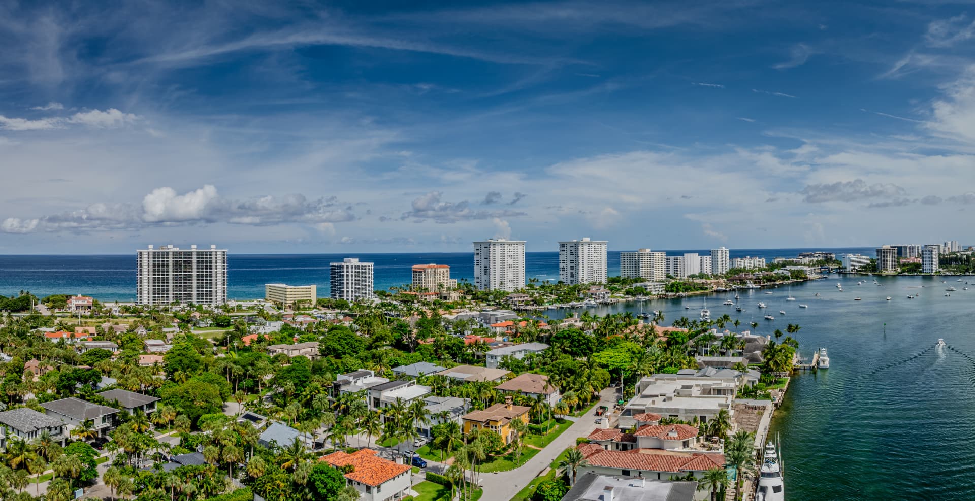 Aerial view of waterfront homes and the coastline in Boca Raton, Florida