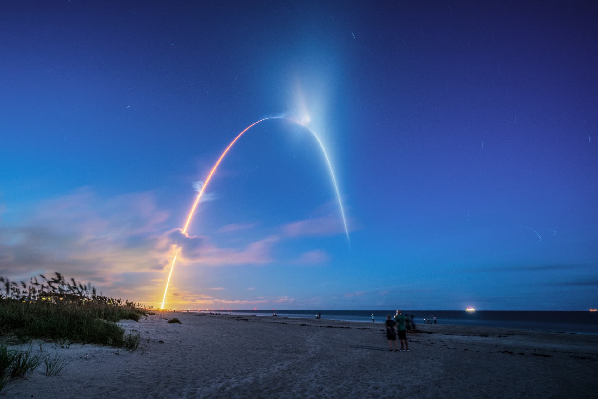 Rocket launch visible over the Atlantic coast on Florida's Space Coast